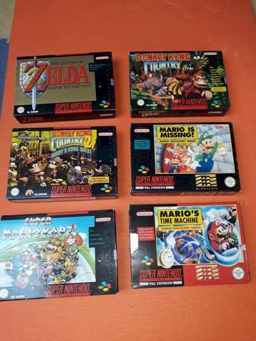 Super Nintendo games with their original packaging